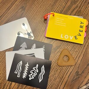 Lovevery Charmer play guide and toys